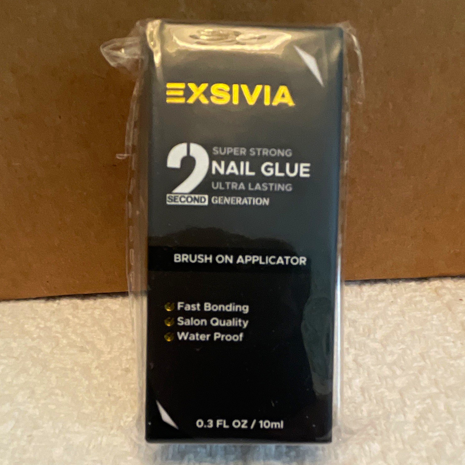 EXSIVIA Ultra Lasting Nail Glue 10ml Brush On Fast Bonding Waterproof Black