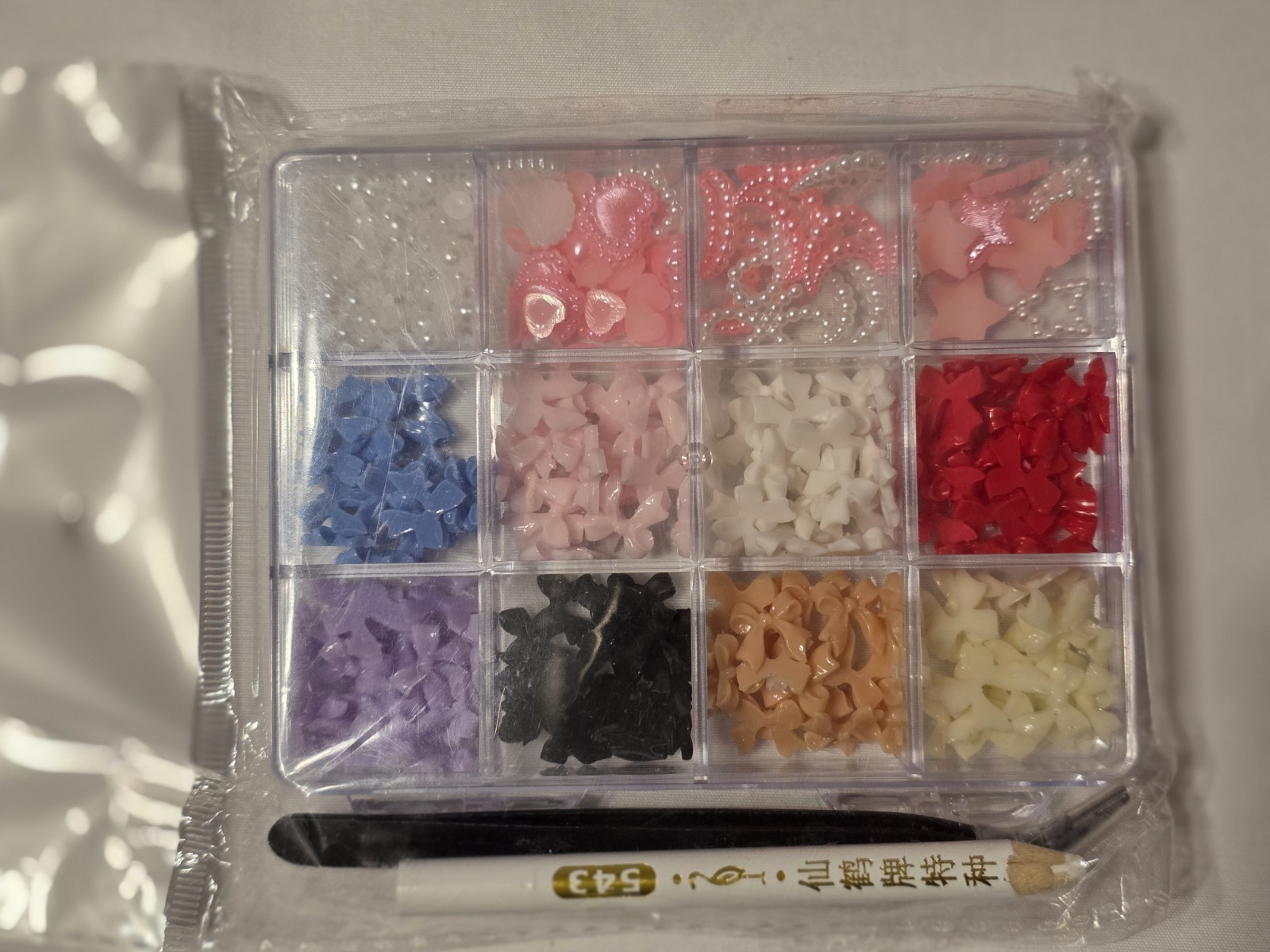 Nail Tech Supply Lot: 600pc Tips, 3x 3D Bow Charm Kits, Bottles, Hello Kitty
