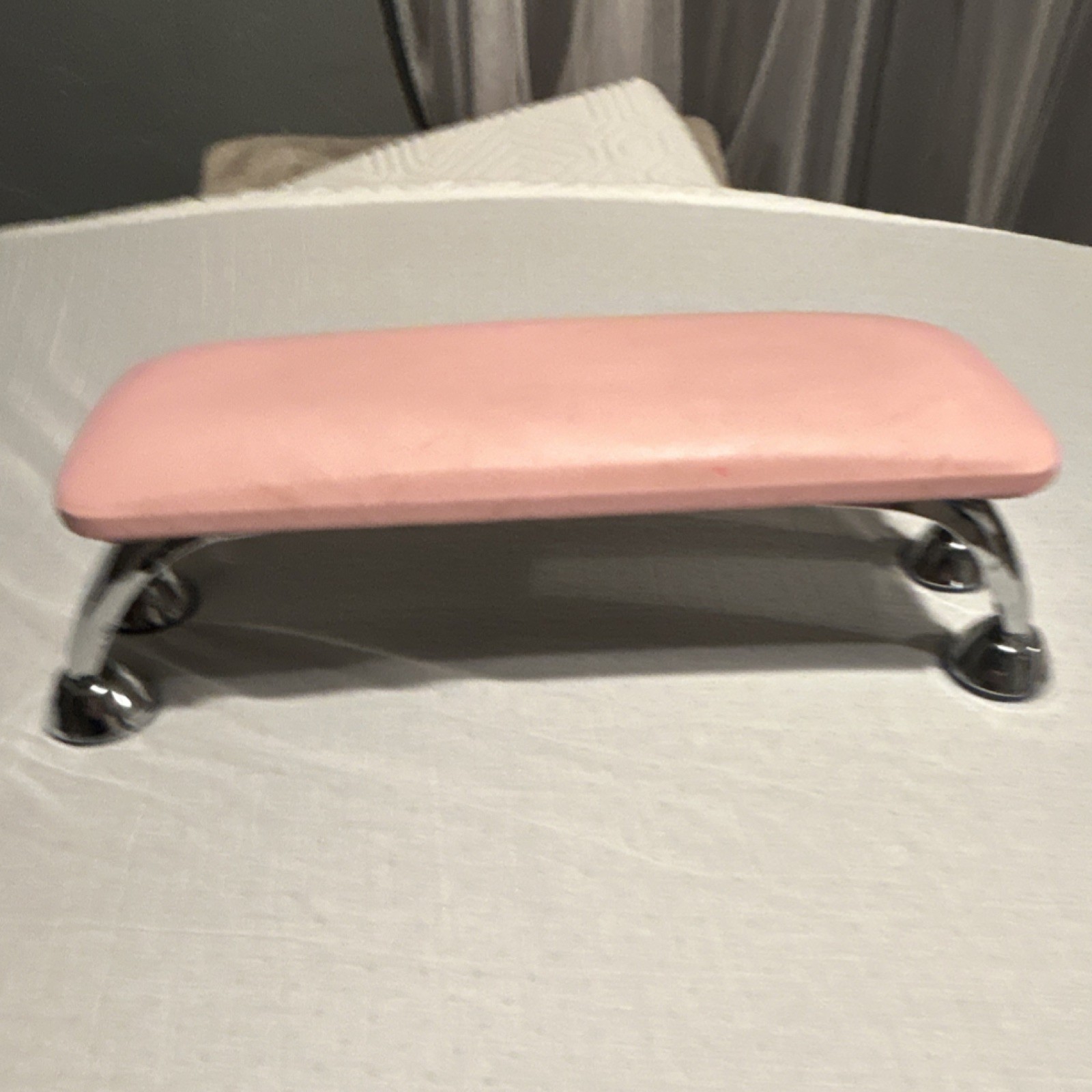 Pink Ergonomic Hand Pillow for Nail Art with Metal Legs and Fabric Cover