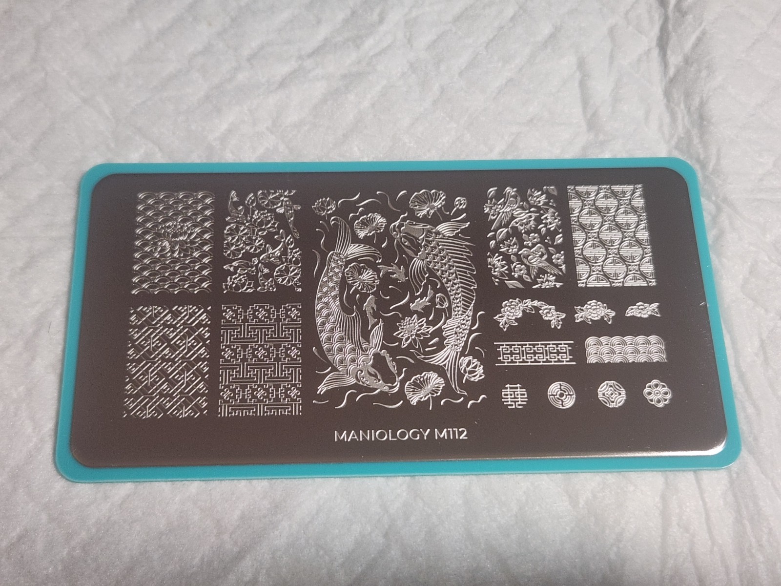 Maniology Nail Stamping Plate – M112 – Koi Pond