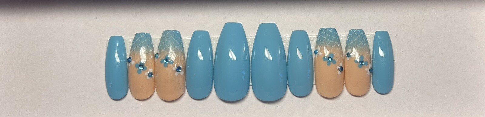 Aqua with flowers and netting press on nails