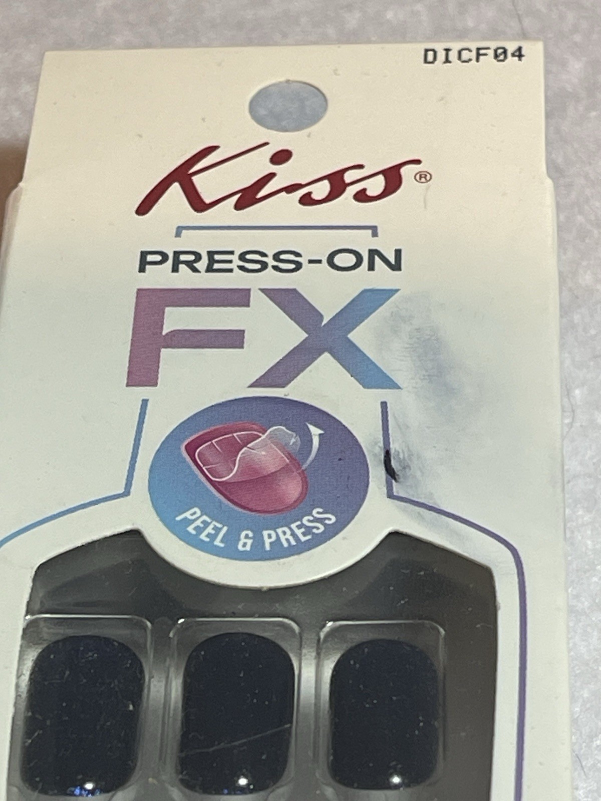 Kiss Press-On FX fake nails short squoval navy blue.