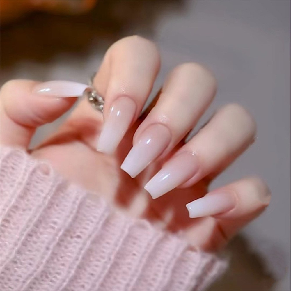 Fashionable Press On Nails featuring Ombre Milky White Long Coffin Shape Design