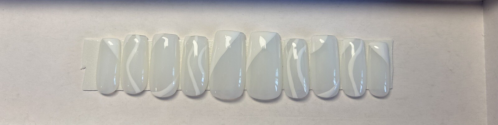 Milky white with bright white swirls press on nails