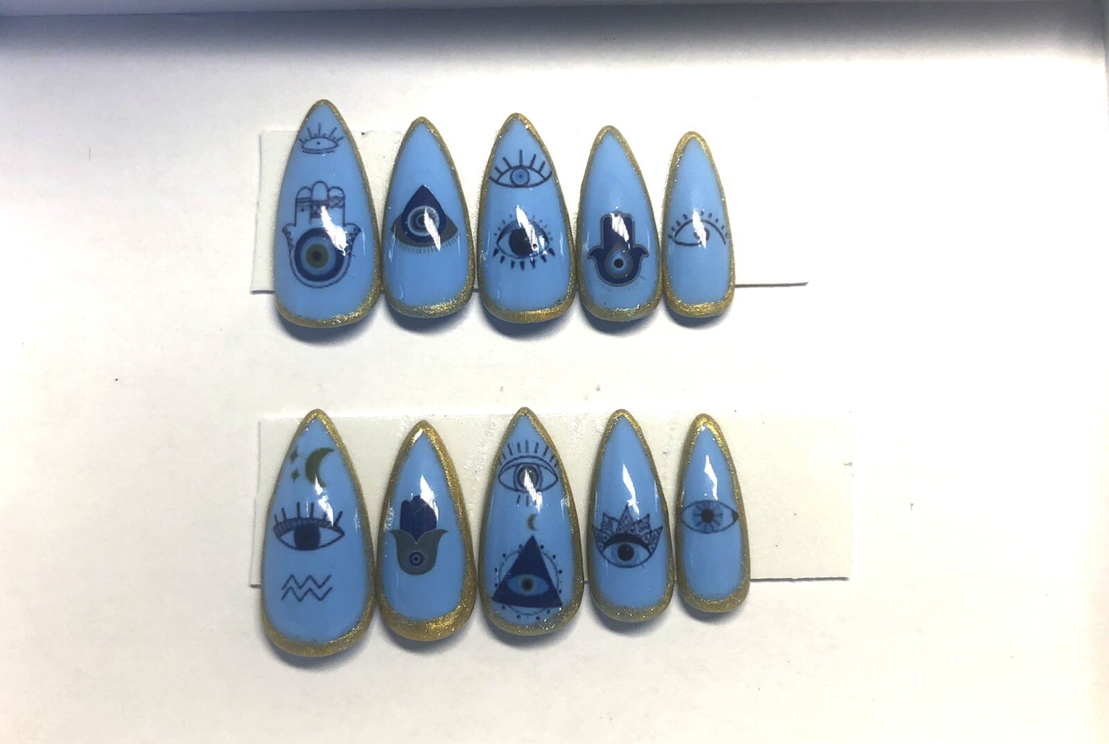 Third eye blue and gold press on nails