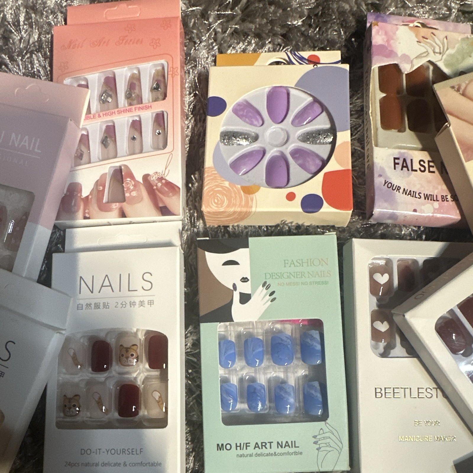1 15 brand new nail sets * Assorted colors, designs, lengths, and styles *