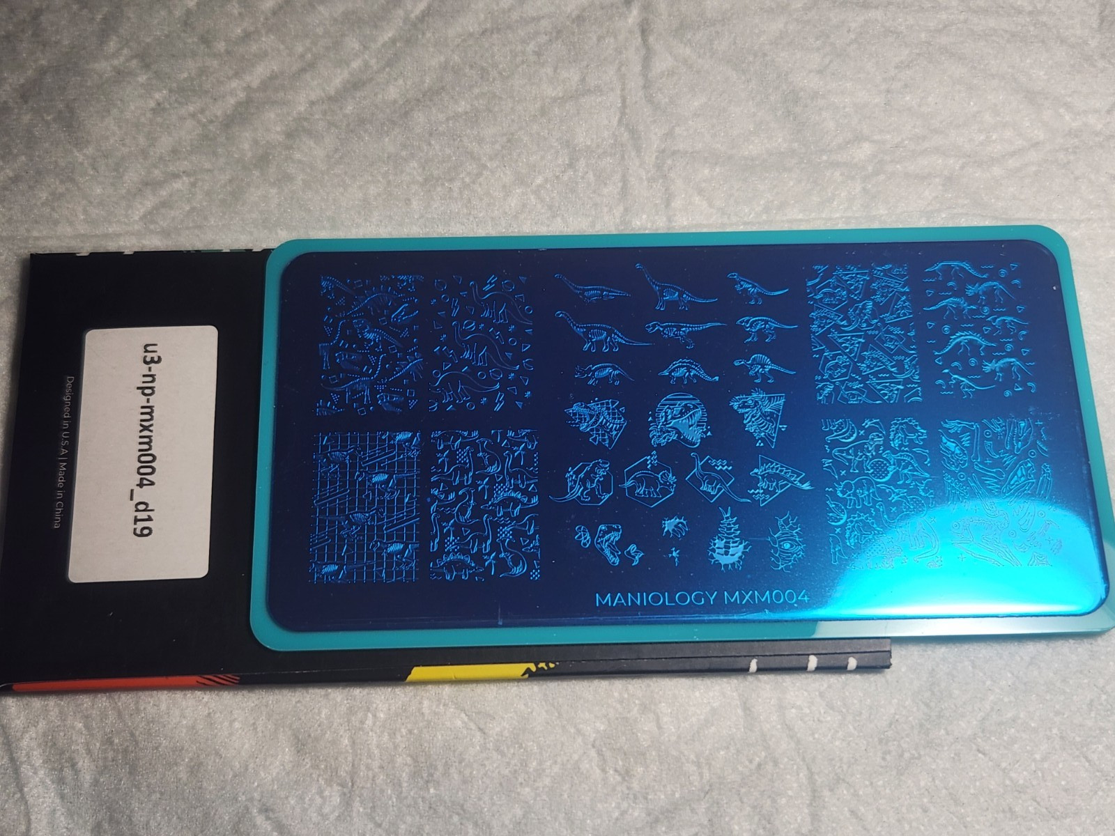 Maniology Lonely Nail Stamping Plate – MXM004 Dinosaurs New w/ sleeve