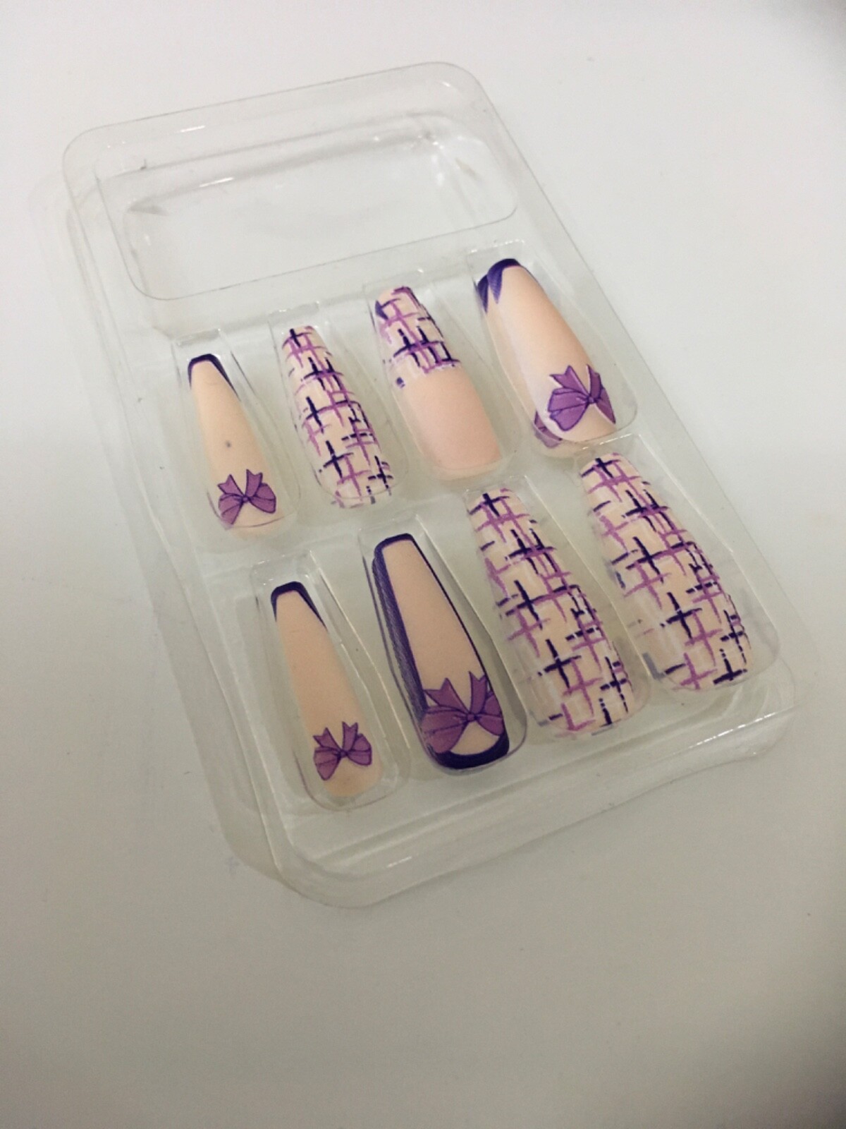 Cute pink and purple nails (glue not included)