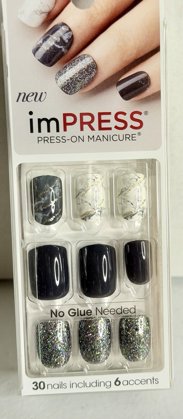 Short nail bundle. 4 sets, multiple sizes in each set. Brush on glue.