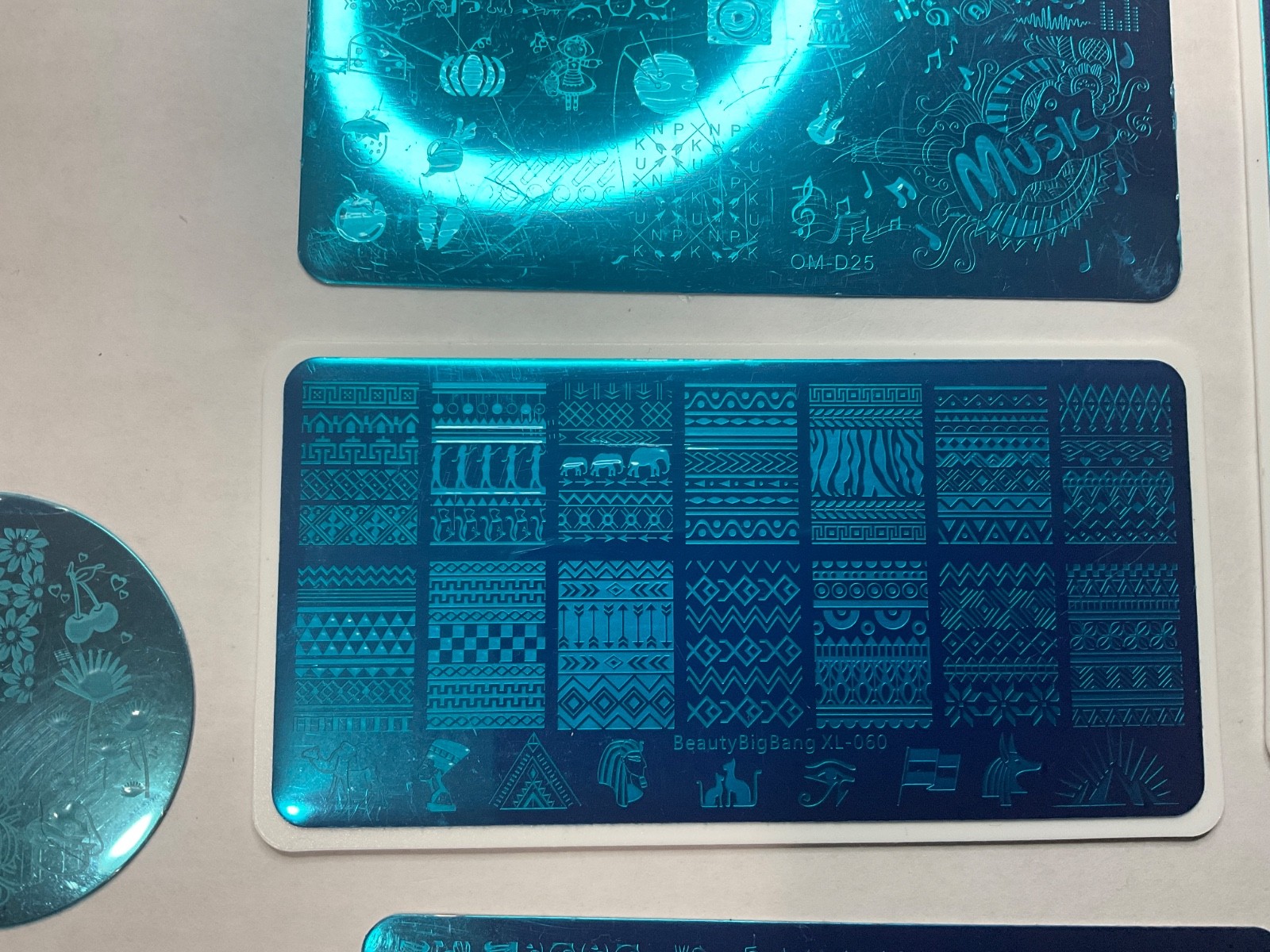 Mixed nail stamping plate bundle featuring multiple brands
