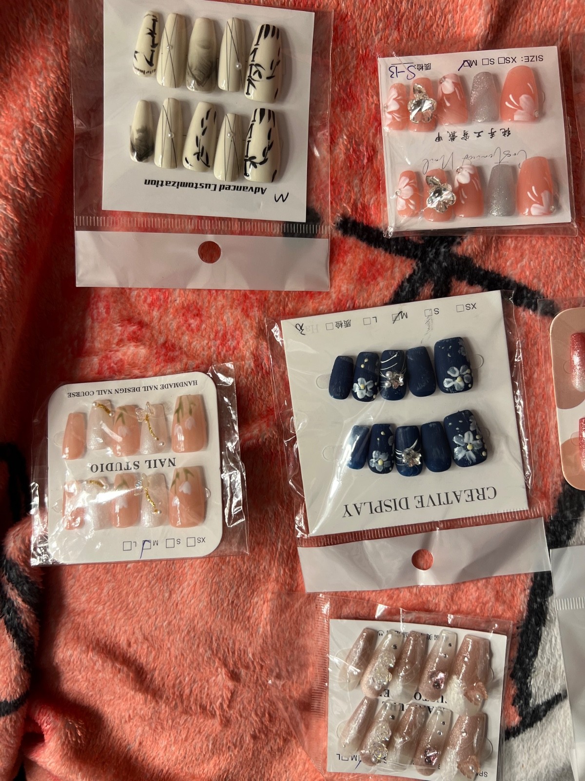 Super high quality, reusable, handmade press on nails. You get 5 pairs with glue