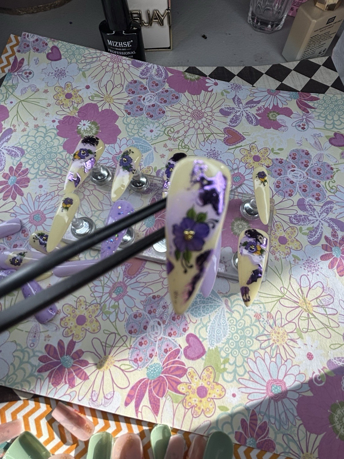 20 piece set handmade press on nails. Yellow purple floral med/short Stiletto