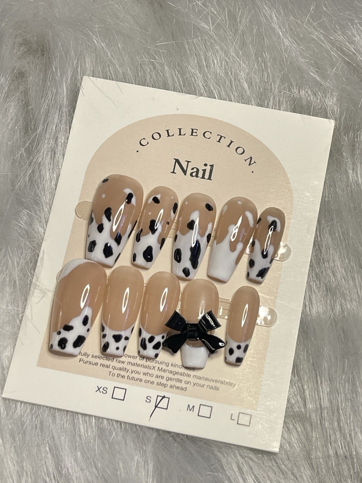 Cow pattern 10 piece press on nails nude long coffin size S